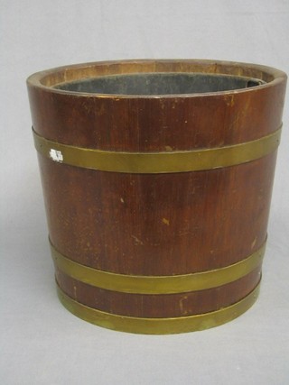 An oak coopered waste paper basket/planter complete with liner, 12"