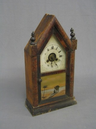 An American 8 day alarm shelf clock with painted dial  contained in a pine case, the door painted a nomad with camel, 8"