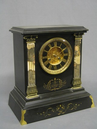 A 19th Century French 8 day striking mantel clock contained in a black and white marble architectural case with Arabic numerals