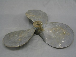 A brass 3 bladed ships propeller marked 22 x 13 20"