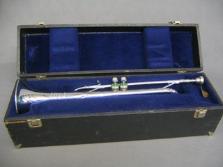 A "silver" twin valved trumpet "The American Command Premier Edition" custom built for Heritage Anaheim Calif