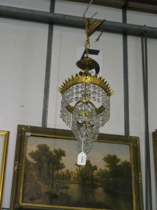 A gilt metal oval 3 drop electrolier with  lozenge decoration