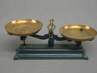 A pair of 19th Century iron and brass scales 