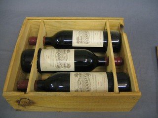 3 bottles of 1986 Chateau La Cardonne (Domaine Barons de Rothchild) Medoc contained in a wooden case