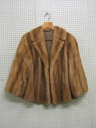 A lady's blonde mink half length jacket