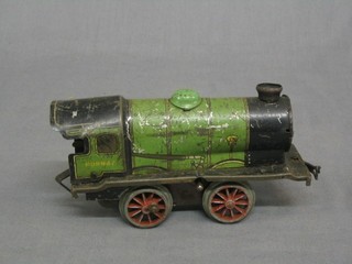 A Hornby clock work locomotive clock work tank engine with green livery (f)