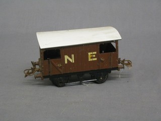 A Hornby break wagon marked NE
