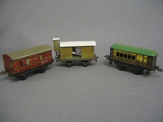 A Hornby break/guard van, marked Nord, a Hornby Pullman carriage and an LMS carriage (3)