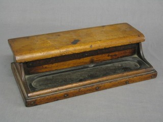 A rectangular inkwell with hinged lid, the front  marked Black Copy Red Blue, 12" (no bottles)