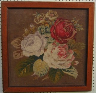 A 19th Century Berlin wool work panel "Flowers" contained in a mahogany finished frame
