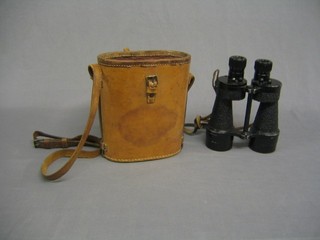A pair of BH&C Ltd binoculars, prasmatic no. 5, contained in a leather carrying case