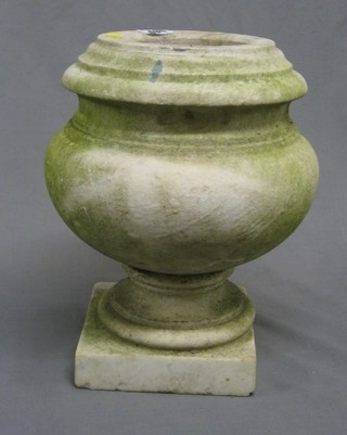 A carved white marble urn 12"