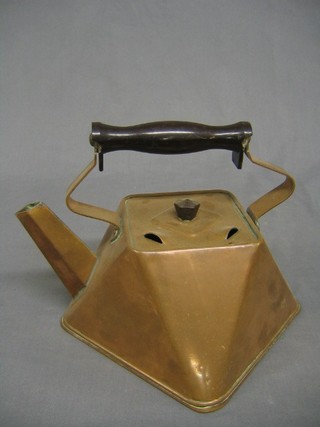 A shaped copper kettle 