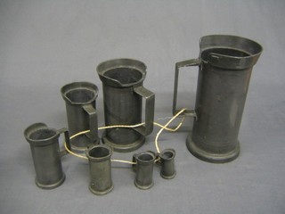 7 19th Century Continental graduated pewter tankards
