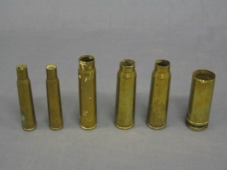 A collection of WWII canon shell cases