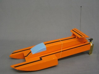 A radio controlled wooden model hydrofoil