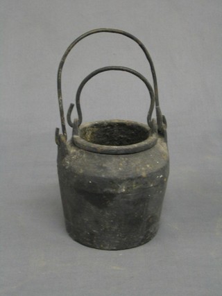 An old iron glue pot