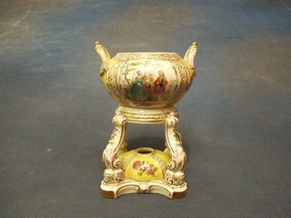 A 19th Century Berlin porcelain twin handled incense/oil burner of oval form, the base with sceptre mark 6" (f and r)