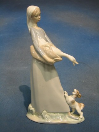A Lladro figure of a standing girl with goose and puppy, base incised 6356, (ref 4846) 12"