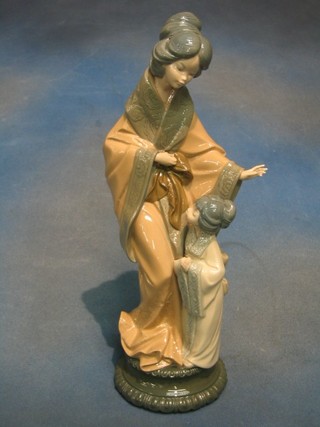 A Nao figure of a standing Geisha girl and child 15" (fingers f)