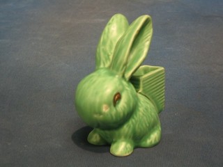 A  Sylvac green glazed match striker in the form of a seated rabbit 4"