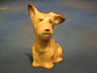A brown glazed "Sylvac" figure of a seated dog 6"