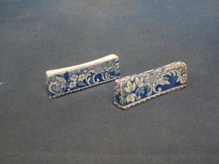 A pair of 19th Century blue and white pottery knife rests 3"
