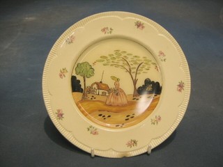 A circular Clarice Cliff plate with rose decoration (the centre painted later), the reverse marked Clarice Cliff Newport Pottery England, RDN 840076 (old chip to rim), 9"