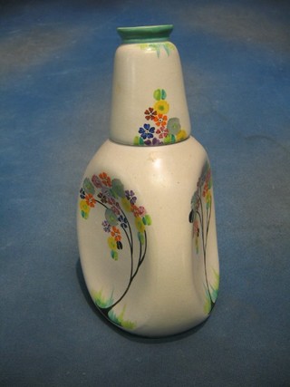 A Carltonware pottery musical decanter and stopper together with a matching beaker, the base marked Carltonware 1047 3365