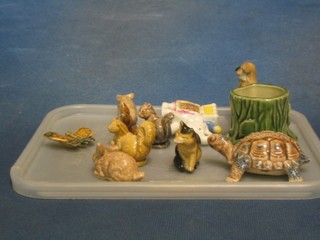 A Wade figure of a tortoise, a small Wade vase in the form of a tree trunk supported by a Koala, 7 Wade Whimsies - 2 squirrels, seated dog, doe, rabbit, pig, butterfly and a figure of an elephant