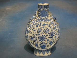 A 19th Century Oriental blue and white porcelain moon flask with dragon handles, 11" (neck f and r)