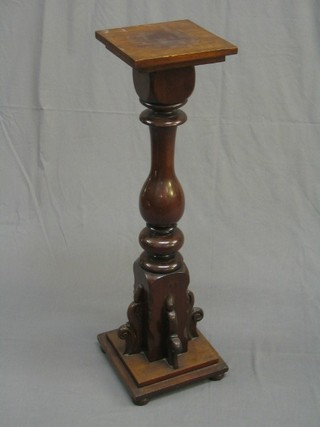 A Victorian turned mahogany torchere  (formerly a mule post) 
