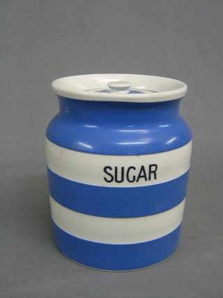 A circular T G Green blue and white striped storage jar marked sugar, the base with green Cathedral mark 8"