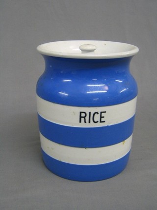 A T G Green blue and white striped storage kitchen jar, the base with black shield mark 8"