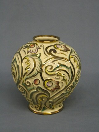 A Wade globular shaped gilt glazed pattern vase, the base marked Wade England 9"