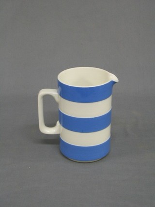 A T G Green Cornish kitchenware blue and white striped jug, the base with green shield mark 5 1/2"