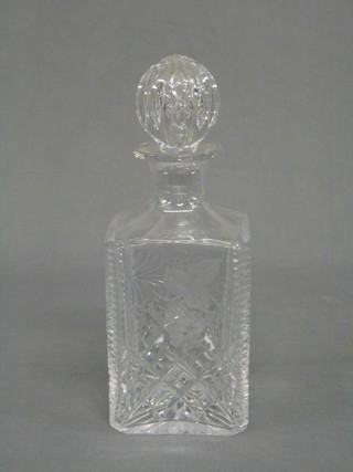 An etched glass spirit decanter