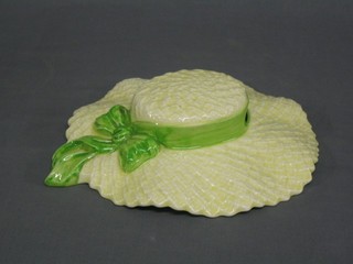 A 1930's pottery wall pocket in the form of a lady's straw hat 10"