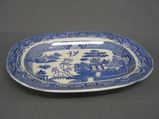 A blue and white Willow pattern meat plate 18"