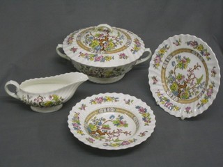 A 28 piece Royal Doulton Indian Tree pattern dinner service comprising 2 circular twin handled  tureens and covers (handles f and r), 3 graduated meat plates, sauce boat, 6 pudding bowls 8", 5 dinner plates 11", 6 side plates 8", 5 tea plates