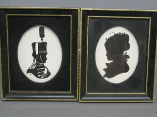 A modern silhouette of an Army Officer 3 1/2" oval and 1 other of a lady