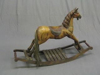 A reproduction Victorian model rocking horse