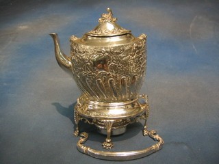 A Victorian Britannia metal oval embossed tea kettle on stand (f)