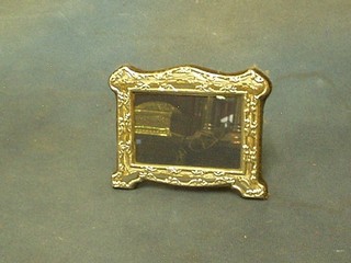 A modern embossed silver easel photograph frame 5"