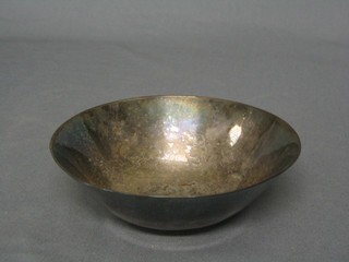 A circular planished silver plated bowl by the Duchess of Sutherland Cripples Guild, the base marked WM 5"