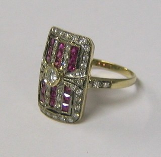 A lady's attractive gold dress ring set 6 rows of rubies supported by diamonds throughout (approx 0.40ct)
