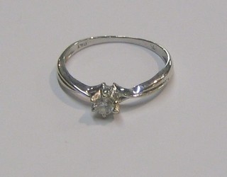 A lady's Italian white gold dress ring set a white stone