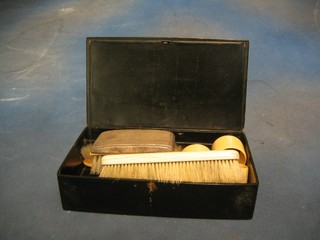 A silver backed clothes brush, do. hair brush, 4 ivory napkin rings and a collection of flatware contained in a lacquered box