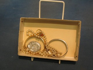 A silver bracelet and a small collection of costume jewellery