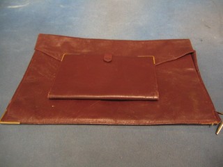 A red leather Ritz club wallet 7" and a do. folder 13"